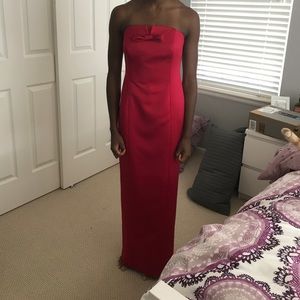 Long red satin gown. Size 2.